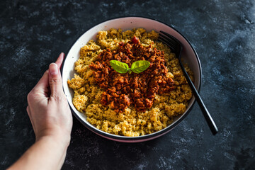 vegan bolognaise couscous with plant-based mince sauce, healthy plant-based food
