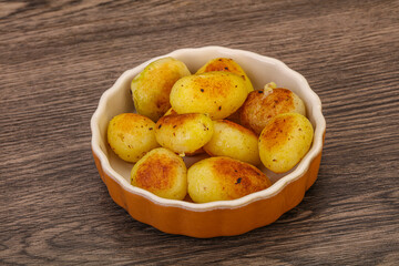 Naklejka na ściany i meble Roasted baby potato in the bowl