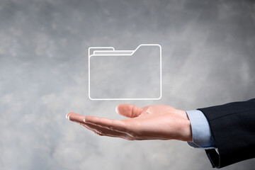 Businessman hold folder icon.Document Management System or DMS setup by IT consultant with modern...