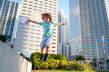 Future city concept. Child and modern buildings. Kid in town skyscraper.