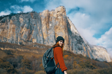Fototapeta na wymiar woman hiker walk nature mountains travel freedom