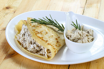 Pancake with chicken and sause