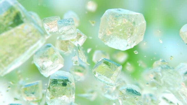 Jumping frosted fresh ice cubes in 4K Slow motion