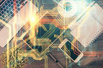 Double exposure of map hologram drawing over desktop. Top view. International connection concept.