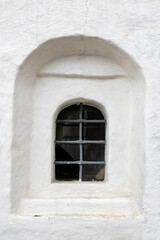 Barred window of a medieval church. Yaroslavl, Yaroslavl Oblast, Russia.