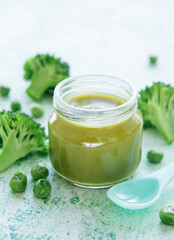 Baby food. Organic green broccoli  puree with ingredients.
