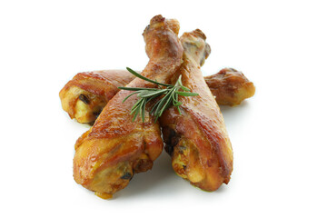 Roast chicken drumsticks isolated on white background