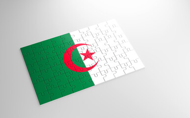 A jigsaw puzzle with a print of the flag of Algeria, pieces of the puzzle isolated on white background. Fulfillment and perfection concept. Symbol of national integrity. 3D illustration.