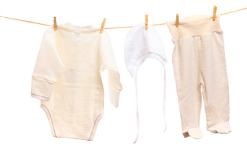 Baby clothes on a clothesline on white  background