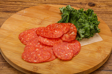 Italian spycy pepperoni sausage slices