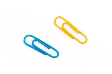 colored paper clips isolated  - IMAGE