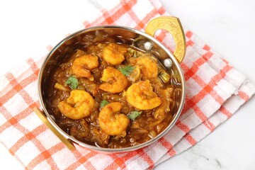 Indian food- Prawns masala or shrimp curry. Also known as Kolambi che Kalvan in Marathi. Chingri fry. Maharashtrian Prawns curry. Copy space.