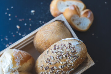 bun with poppy seeds in a basket