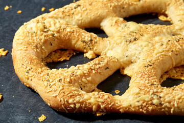 food, baking and cooking concept - close up of cheese bread on kitchen table