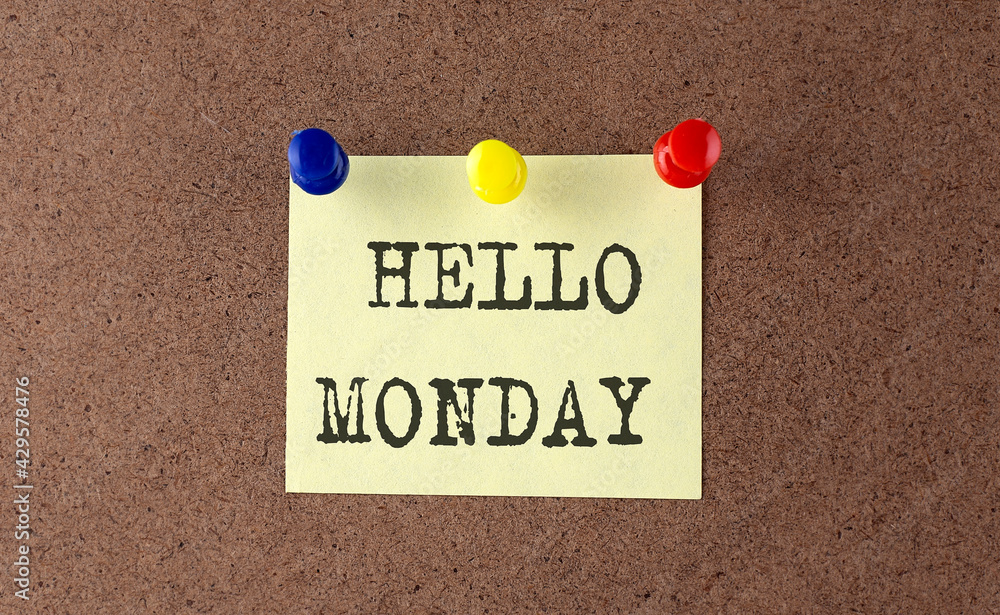 Poster hello monday text written on message board.