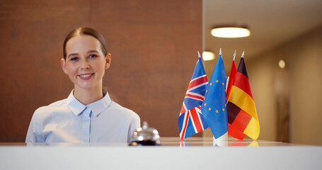 Portrait of beautiful young woman hotel receptionist