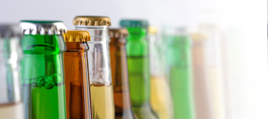 colorful beer bottle necks close-up,