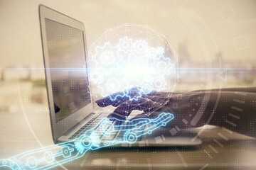 Double exposure of woman hands working on computer and data theme hologram drawing. Tech concept.