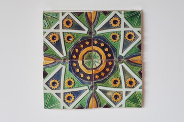 Traditional Portuguese, glazed ceramic tiles. Azulejo colorful  ornate pattern, for design, backdrop. Abstract old decorative painted pattern tiles