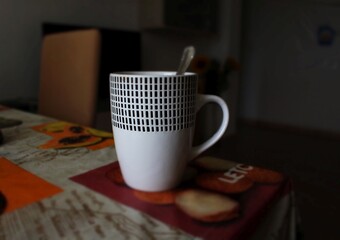 Taza de cafe con cuchara
