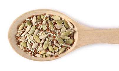 Seed mix, sunflower, sesame, linseed and pumpkin seeds in wooden spoon isolated on white background, top view