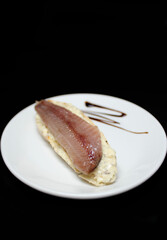 Anchoa en tostada de queso