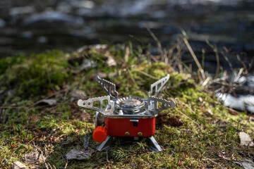 portable camping gas stove in nature.
