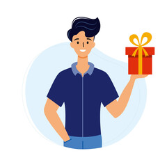 Happy man in blue shirt holds gift in his hands. Boy with a gift.