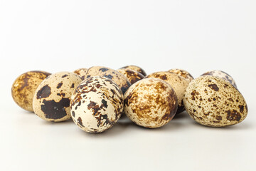 Stewed quail eggs on a white background
