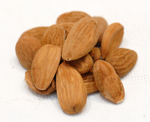 Sicilian peeled almonds are a typical product of Sicily on white background