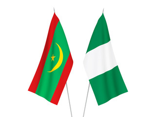 National fabric flags of Nigeria and Islamic Republic of Mauritania isolated on white background. 3d rendering illustration.