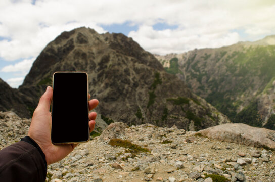 Cell Phone On Top Of The Mountain, Looking For Signal