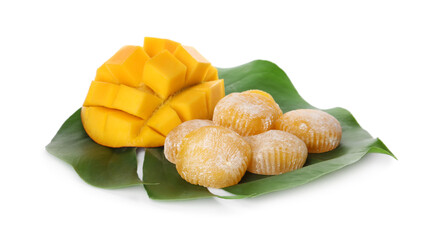 Delicious mochi with green leaf and mango on white background. Traditional Japanese dessert