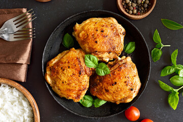 Fried chicken thighs in plate