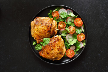 Fried chicken thighs with vegetables
