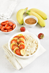 Oatmeal porridge with strawberry and banana