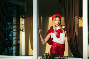 Girl in a red beret and red sunglasses