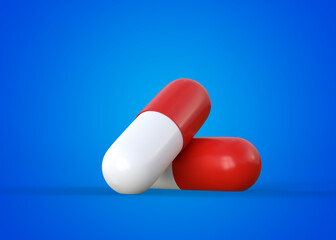 Two red-white pills capsules on blue background, medical treatment, pharmaceutical or medication concept. 3D rendering illustration