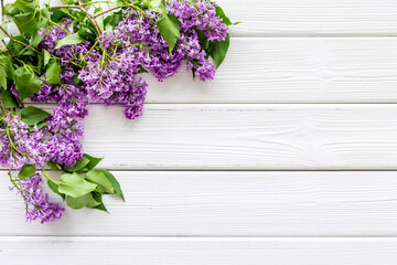 Flowers composition. Purple lilac flay lay, copy space