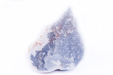 macro mineral anhydrite stone on a white background
