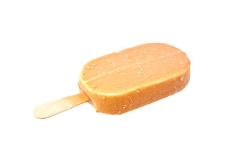 Ice cream in caramel glaze on a wooden stick isolated on white