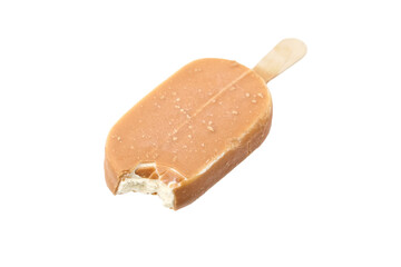 Bitten ice cream in caramel glaze on a wooden stick isolated on white