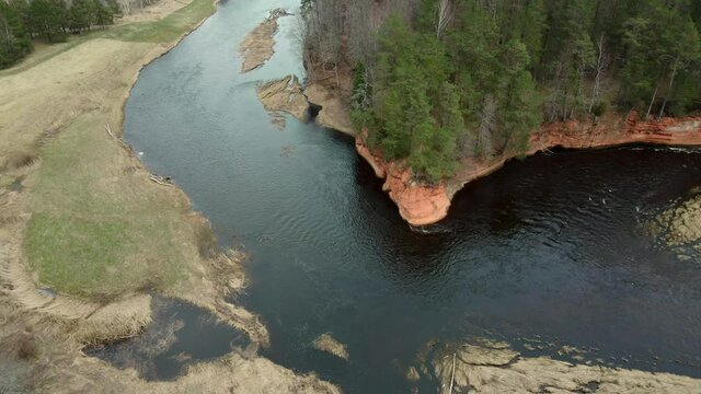 Untitled ProjectRed rocks on the river Salaca. Sandstone cliff in Latvia from Drone Aerial