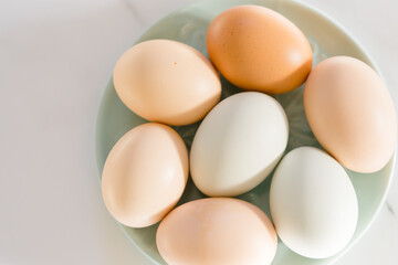 Oval eggs on a round plate