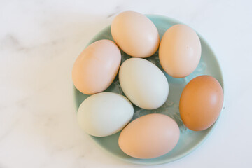colorful eggs on a round blue plate