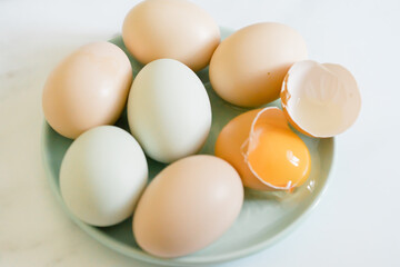 Fresh colorful eggs on a plate