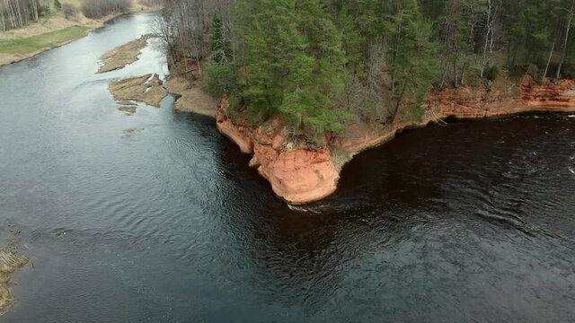 Untitled ProjectRed rocks on the river Salaca. Sandstone cliff in Latvia from Drone Aerial