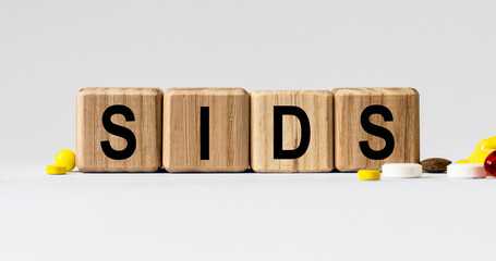 cubes with the word SIDS on them. Care concept.