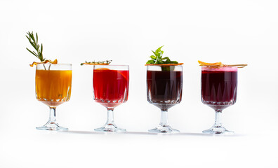 Set of various hot exotic teas in glass on white background