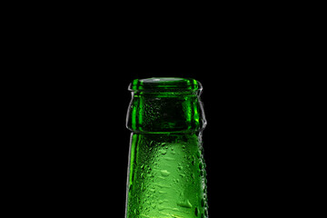 Beer bottle neck on black background